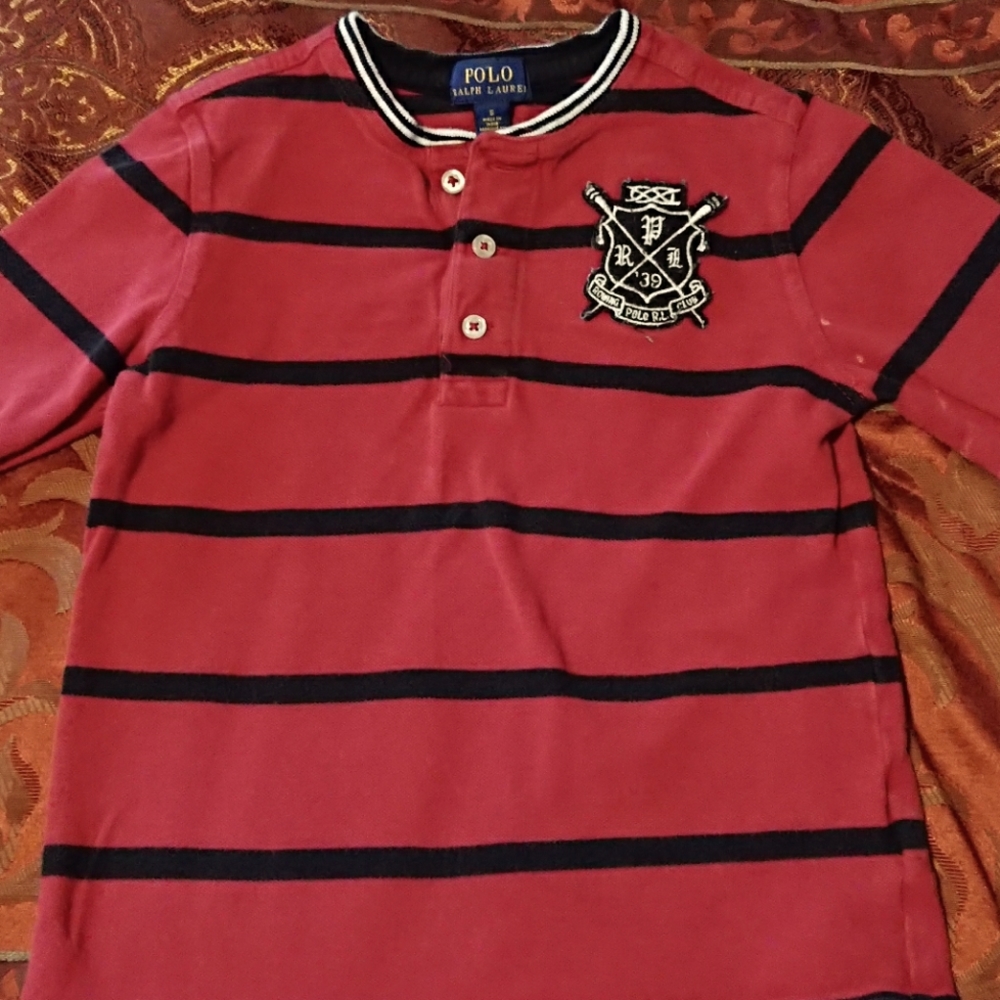 Gently used polo long sleeved boys shirt.